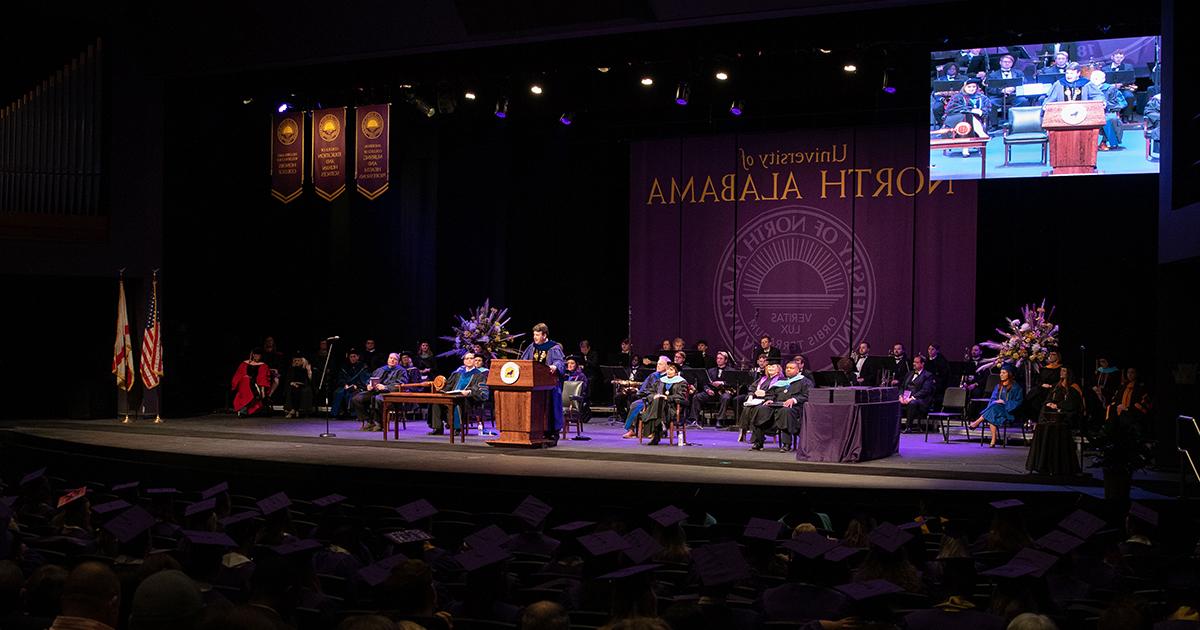 President Ken Kitts addresses the 2021 fall commencement audience in Norton Auditorium.